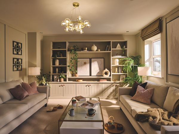 A beautiful, modern Charles Church living room with two sofas.