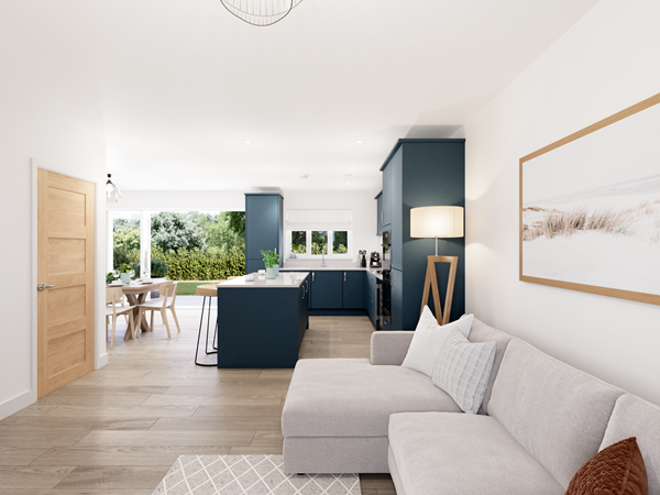 Bright open-plan living area with grey sofa, blue kitchen cabinets, breakfast bar and dining space overlooking garden.