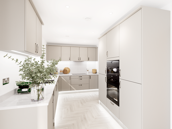 Modern kitchen with light gray cabinets, white countertops, and integrated appliances including an oven. A glass vase with greenery sits on the counter, and herringbone-patterned flooring adds warmth. Recessed ceiling lights brighten the space.