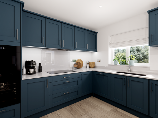 Modern kitchen with navy shaker cabinets, white quartz worktops, built-in oven and large window bringing natural light