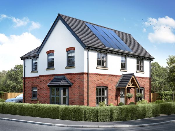 A modern premium new Charles Church home, the Seacombe, against a blue sky.