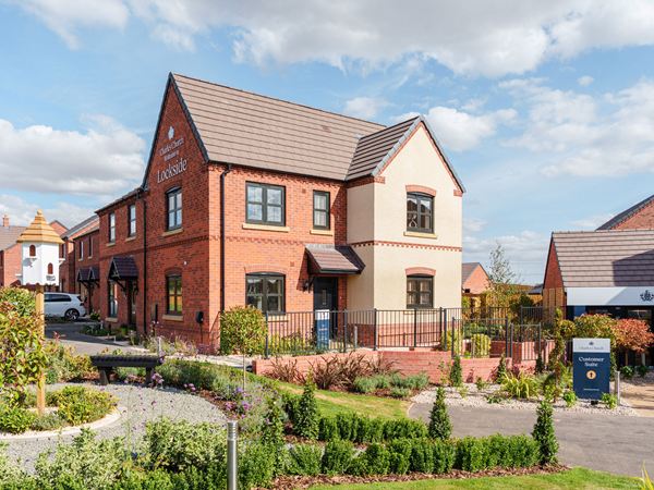Exterior view of Lockside show home with landscaped gardens