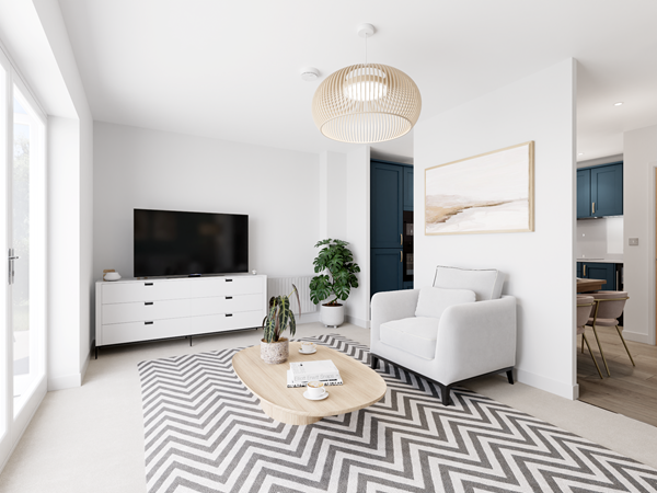 Bright living room with white armchair, chevron rug, wooden coffee table, TV unit and view into modern blue kitchen.