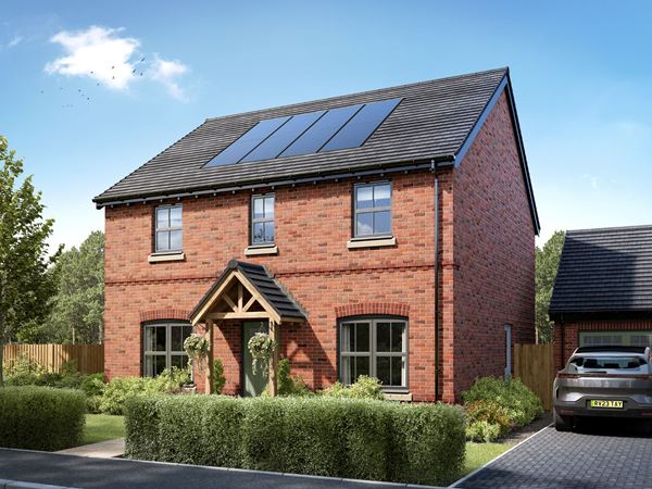 An exterior shot of a double-fronted Charles Church home, the Hastings, against a blue sky with lavender in the garden.