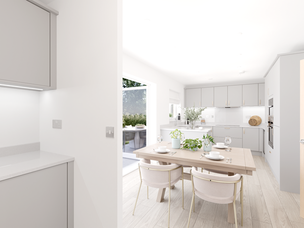 Open-plan kitchen and dining area with light gray cabinets, white countertops, and a wooden dining table set for four. Large glass doors open to the garden, allowing natural light to flood the space. Wooden flooring and recessed ceiling lights complete the modern look.