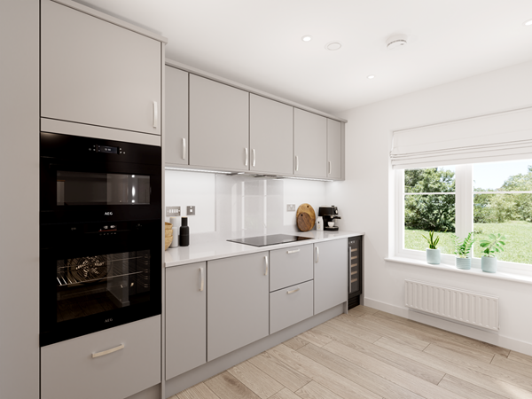 Light grey modern kitchen with integrated oven, sleek cabinets, induction hob, and large window overlooking greenery