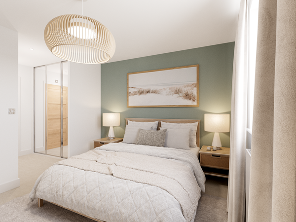 Contemporary bedroom with a large bed dressed in neutral bedding and cushions. A green feature wall behind the bed adds contrast, complemented by wooden bedside tables with lamps. A woven pendant light hangs from the ceiling, and a window with light curtains provides natural light.