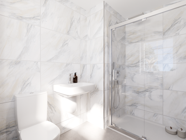 Bright ensuite bathroom with marble-effect tiles, walk-in glass shower, white basin and toilet under natural light