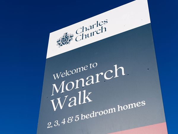 Charles Church Monarch Walk sign promoting new family homes available.