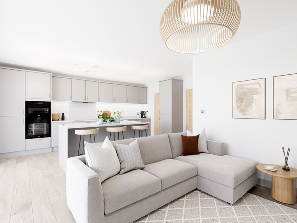 Open-plan kitchen diner with grey cabinets, white island breakfast bar, light wood flooring and modern neutral décor