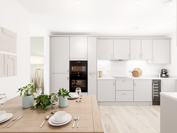 Modern kitchen-diner with light grey cabinets, integrated appliances, wooden dining table and white quartz worktops