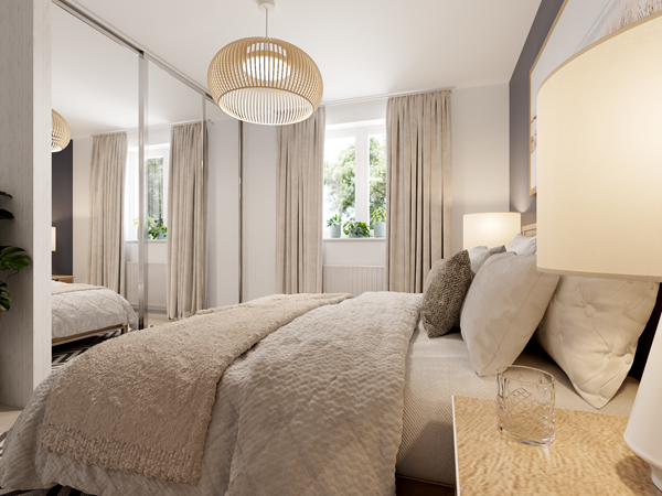 Modern bedroom with a large bed dressed in neutral beige and cream bedding, mirrored sliding wardrobe doors, light curtains on two windows, and a woven pendant light fixture. A bedside table with a lamp and glass tumbler is visible in the foreground.