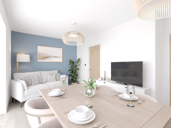 Bright dining area with a wooden table set for four, featuring white plates, glasses, and cutlery. A light gray sofa and a TV on a white media unit are visible in the background. A blue feature wall adds contrast, and a woven pendant light hangs above the table.